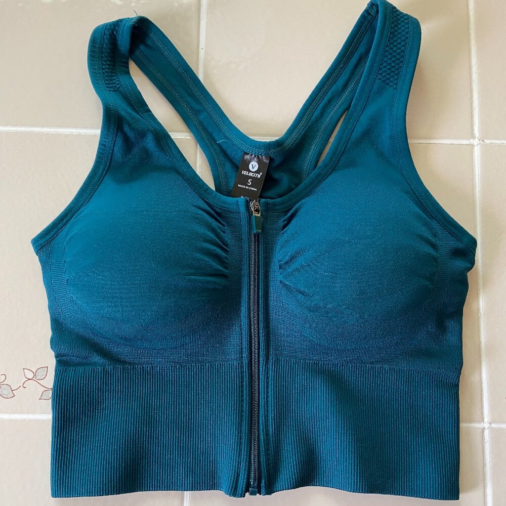 NWOT Velocity padded sports bra. Firm support, size Small. Teal color.